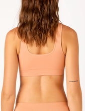 Load image into Gallery viewer, Bare Essentials Recycled Nylon Reversible Padded Crop / Spiced Peach
